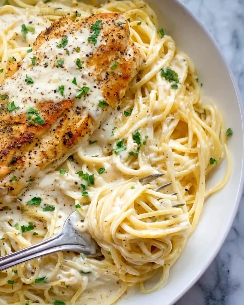 Crock Pot Angel Chicken with Creamy Italian Sauce over Angel Hair Pasta Recipe