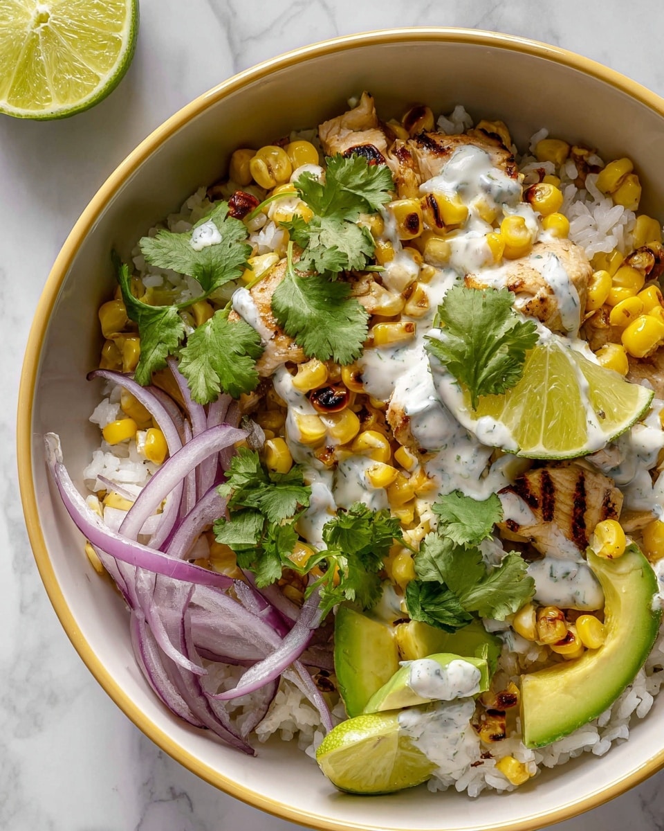 This dish is served in a white bowl with a thin yellow rim. Inside, the bottom layer is white rice, topped with grilled, slightly charred yellow corn kernels. Over the corn, there are pieces of cooked chicken with a light brown color. Thin slices of red onion are scattered around, adding a vibrant purple color. Fresh green cilantro leaves are spread on top along with a creamy white sauce drizzled over the chicken and corn. There are also green avocado slices placed on the side and a large, round slice of lime resting on the rice near the center. The background is a white marbled surface. Photo taken with an iphone --ar 4:5 --v 7