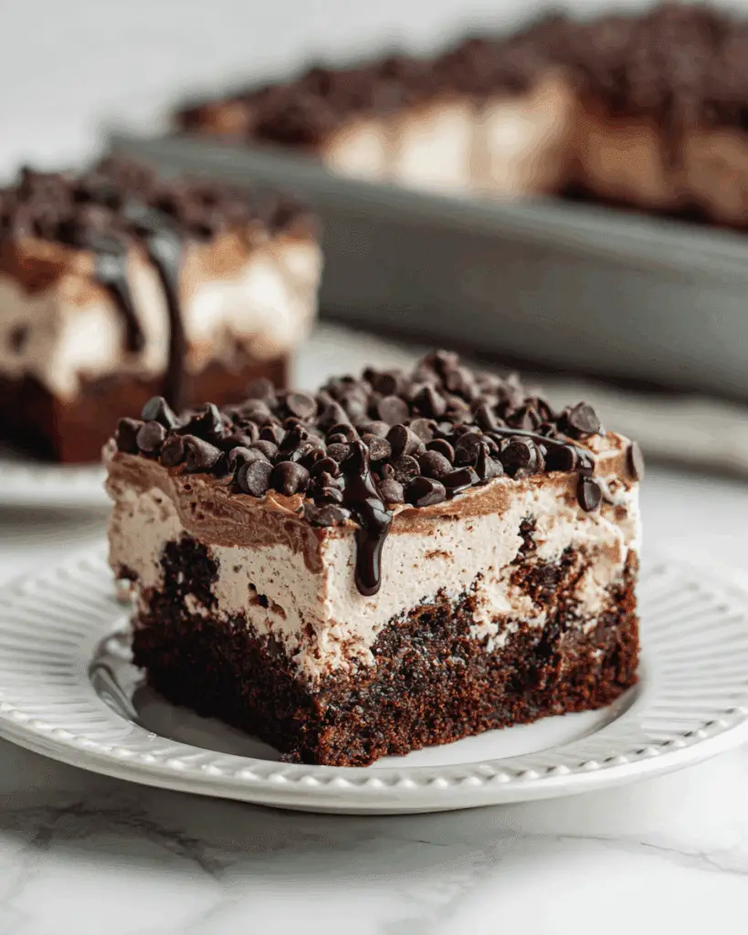 Chocolate Poke Cake with Chocolate Ganache and Whipped Cream Recipe