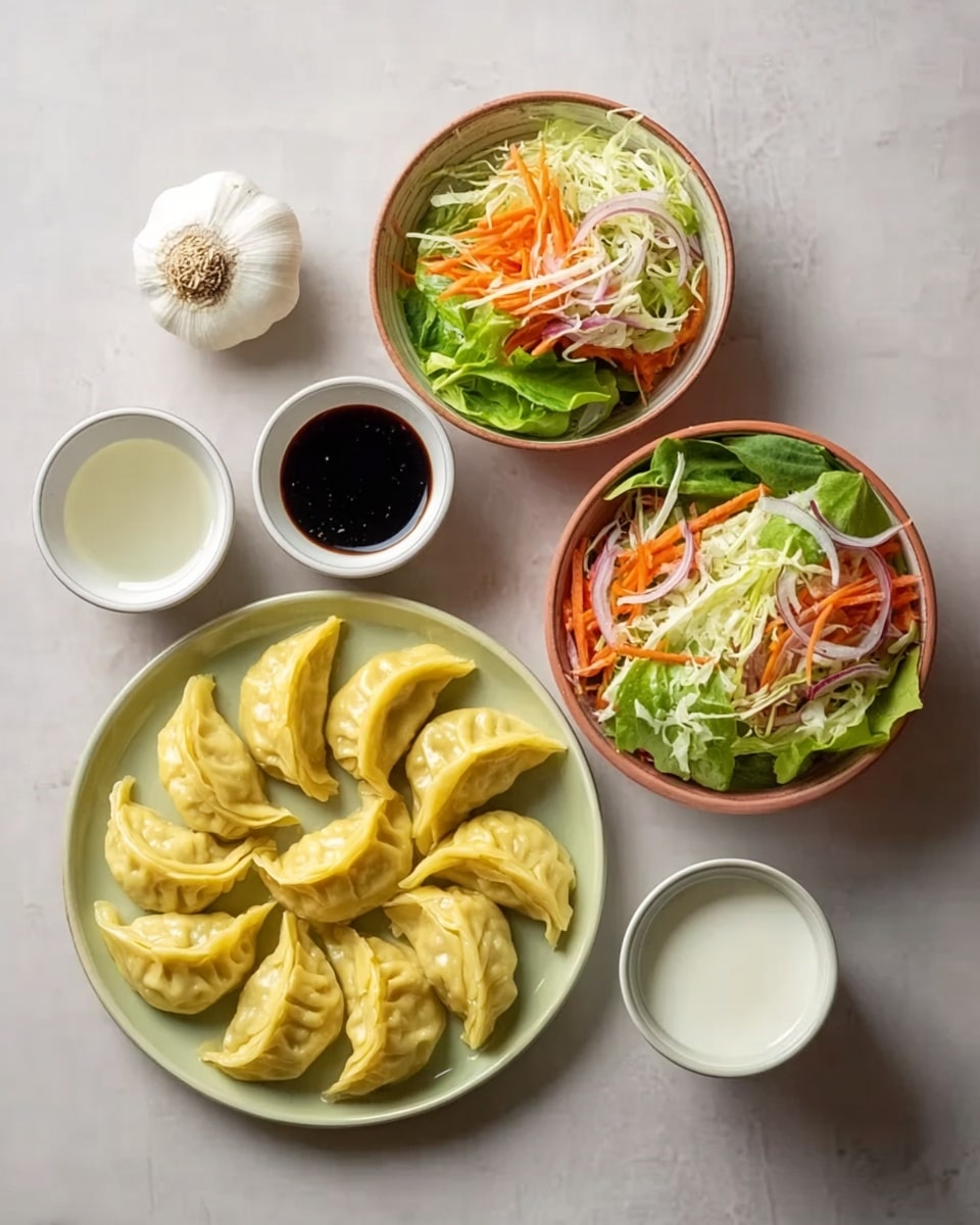 The image shows a round light green plate filled with ten yellow steamed dumplings arranged in a circle. Above the plate, there is a whole head of garlic placed on a white marbled surface. To the left of the garlic, three small white bowls are arranged vertically: the top bowl contains soy sauce, the middle bowl has a light clear liquid, and the bottom bowl holds more soy sauce. To the right of the garlic, a white bowl holds a colorful fresh salad with shredded lettuce, carrots, red onion slices, and green leaves. Next to the salad, a small white cup is filled with a white liquid, likely milk or sauce. photo taken with an iphone --ar 4:5 --v 7