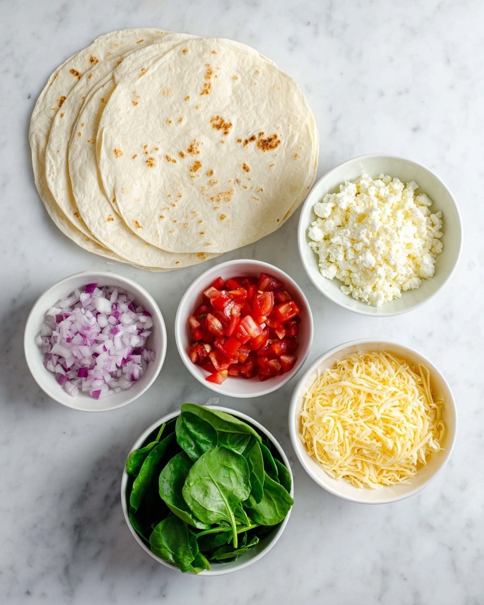 Five small white bowls hold different ingredients arranged in a circle on a white marbled surface. The top left bowl contains finely chopped pale purple onions, the top right bowl has crumbly white cheese, the bottom right bowl is filled with yellow shredded cheese, the bottom center bowl holds fresh bright green spinach leaves, and the middle left bowl contains small diced red tomatoes. To the left side of the image, several white tortillas are slightly overlapping each other, showing light brown spots from cooking. photo taken with an iphone --ar 4:5 --v 7