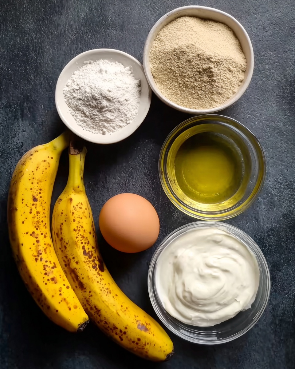 Two ripe yellow bananas with brown spots lie on the left side of a dark surface, next to a white bowl filled with light brown powder at the top right. Below the bananas is a clear bowl with light golden oil, and next to it is a white bowl holding thick white yogurt in the center. An uncracked brown egg is positioned to the right of the yogurt bowl, with a small clear bowl containing white powder placed beneath the egg. Photo taken with an iphone --ar 4:5 --v 7