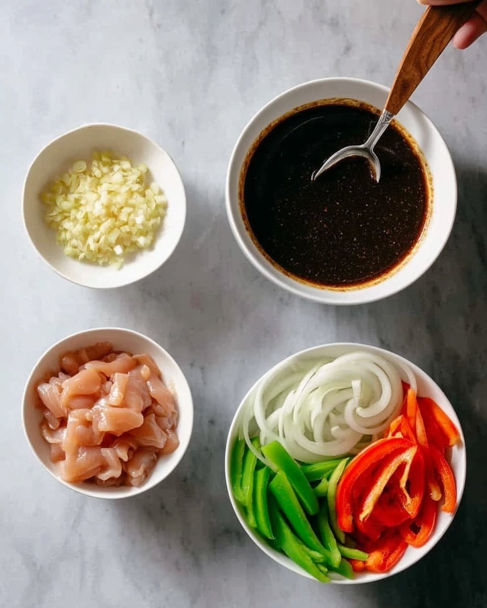 The image shows four white bowls on a white marbled surface. The top right bowl contains a dark sauce with a silver spoon inside, the texture is smooth and slightly shiny. The top left bowl has small, pale yellow minced ingredients. At the bottom left, a bowl is filled with light pink sliced raw meat. The bottom right bowl contains layers of sliced vegetables arranged neatly: white onion slices on the upper half, and green bell pepper slices along with red bell pepper slices on the lower half. A woman's hand holds a wooden spoon resting inside the top left bowl. Photo taken with an iphone --ar 4:5 --v 7