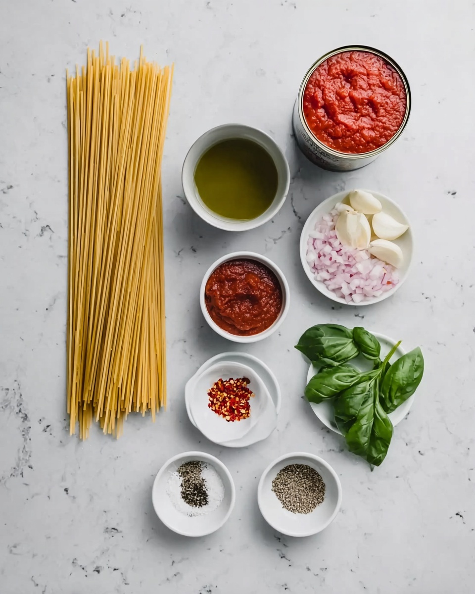 The image shows ingredients arranged neatly on a white marbled surface. On the left, there is a bundle of long, uncooked spaghetti pasta with a smooth, light yellow texture. To the right of the pasta, there is a small white bowl filled with greenish olive oil. Beside it, an open white can of bright red tomato sauce sits with a shiny surface. Below these, there is a small white bowl containing thick, dark red tomato paste. Next to it is a tiny white bowl with red chili flakes scattered inside. Above are two small white plates; one plate holds chopped pink pieces of onion and white slices of garlic, and the other plate holds fresh green basil leaves with smooth and curled edges. At the bottom, three small, round containers hold black pepper, coarse white salt, and fine white salt arranged side by side. Photo taken with an iphone --ar 4:5 --v 7