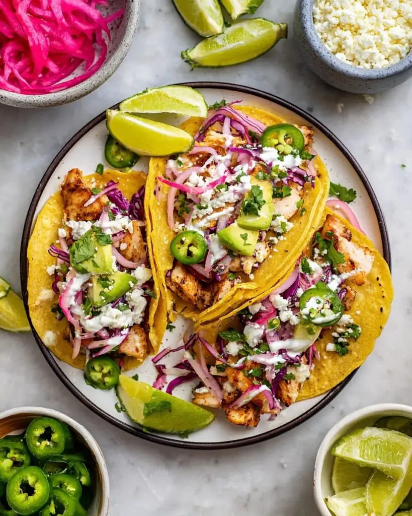Fish Tacos with Lime Crema and Cabbage Slaw Recipe