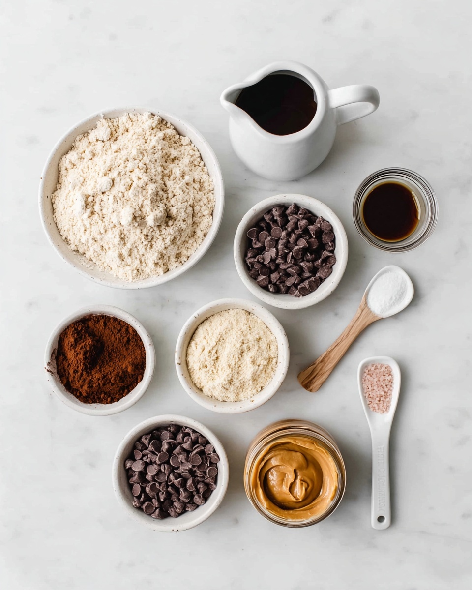 The image shows seven small white bowls and two white spoons arranged neatly on a white marbled surface. From top left, a bowl is filled with light beige flour with a slightly crumbly texture. Next to it on right is a white pitcher filled with dark brown liquid. Below the flour bowl is a bowl filled with small, dark brown chocolate chips. Right of it is a bowl with pale, powdery texture, which looks like almond flour. Below the chocolate chips bowl is a small bowl with dark brown cocoa powder. To its right, a glass jar filled with creamy light brown peanut butter, with a wooden spoon inside. Below the jar is a small white bowl with a dark brown liquid, possibly vanilla extract. On the far right near the middle is a long white spoon with light pink salt. On the bottom left is another white spoon with a white powder, possibly baking soda. All items are neatly placed with clean edges. photo taken with an iphone --ar 4:5 --v 7