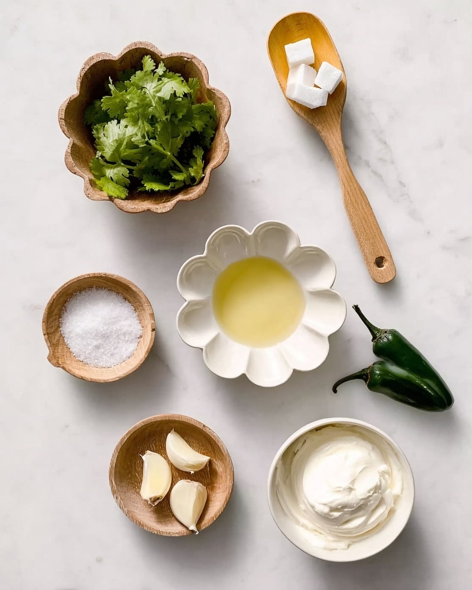 The image shows seven small containers placed on a white marbled surface. At the top left, there is a wooden cup filled with fresh green cilantro leaves. To the right, a wooden spoon holds a few white sugar cubes. Below the spoon, a small wooden scoop contains a yellow liquid. At the center, a white scalloped bowl holds a clear yellow liquid. Below this, a small round wooden bowl is filled with coarse white salt. On the bottom left, a tiny wooden bowl contains two peeled garlic cloves. Finally, at the bottom right, a white bowl has creamy white yogurt, and next to it, a smaller white bowl holds two halves of a dark green jalapeño pepper. Photo taken with an iphone --ar 4:5 --v 7