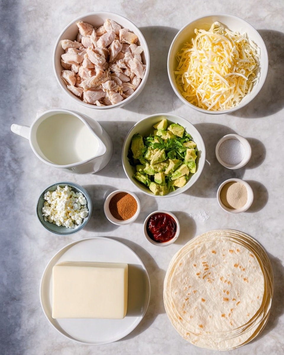 The image shows an overhead view of neatly arranged food ingredients on a white marbled surface. There are three larger white bowls: one with chopped cooked chicken pieces in light brown and pinkish tones, another with shredded pale yellow cheese, and one with diced green avocado chunks mixed with herbs. A white pitcher with white milk is placed near the bottom left, along with a small blue bowl filled with crumbly white cheese. Three small white bowls hold various spices: a beige powder, a deep red powder, and a small amount of salt. Another tiny white bowl contains a dark red sauce. At the bottom, a white plate holds a rectangular block of soft white cheese, and to the right, a stack of round, light beige tortilla wraps is presented on a white plate. The whole setup is clean and organized, with soft natural light highlighting textures and colors photo taken with an iphone --ar 4:5 --v 7