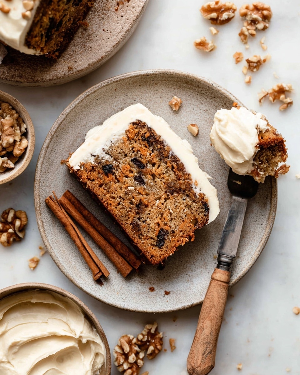 A single slice of brown cake with visible chunks of nuts and dark spots sits on a white plate, topped with a smooth layer of white frosting. Next to the cake slice on the plate are two cinnamon sticks, and a wooden-handled fork holds a bite of the cake with a thick dollop of frosting. Around the plate, pieces of walnuts are scattered, with a small bowl of chopped walnuts at the top left and a bowl of creamy white frosting at the bottom left. The background is a white marbled surface. photo taken with an iphone --ar 4:5 --v 7